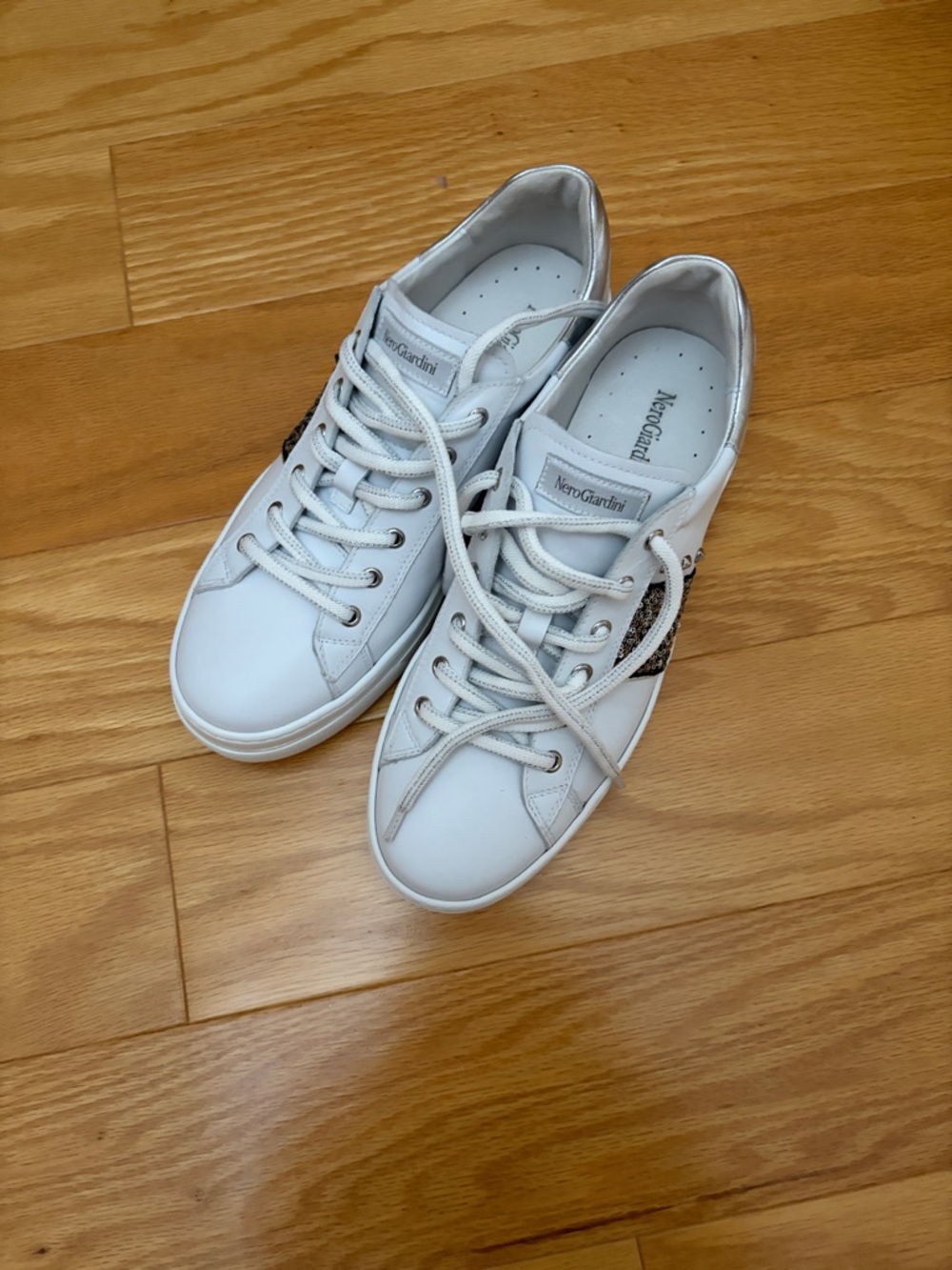Nero Giardini White Sneakers with black and silver accents